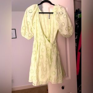 Zara dress with cutwork embroidery.  Sleeve below the elbow, wrap around tie